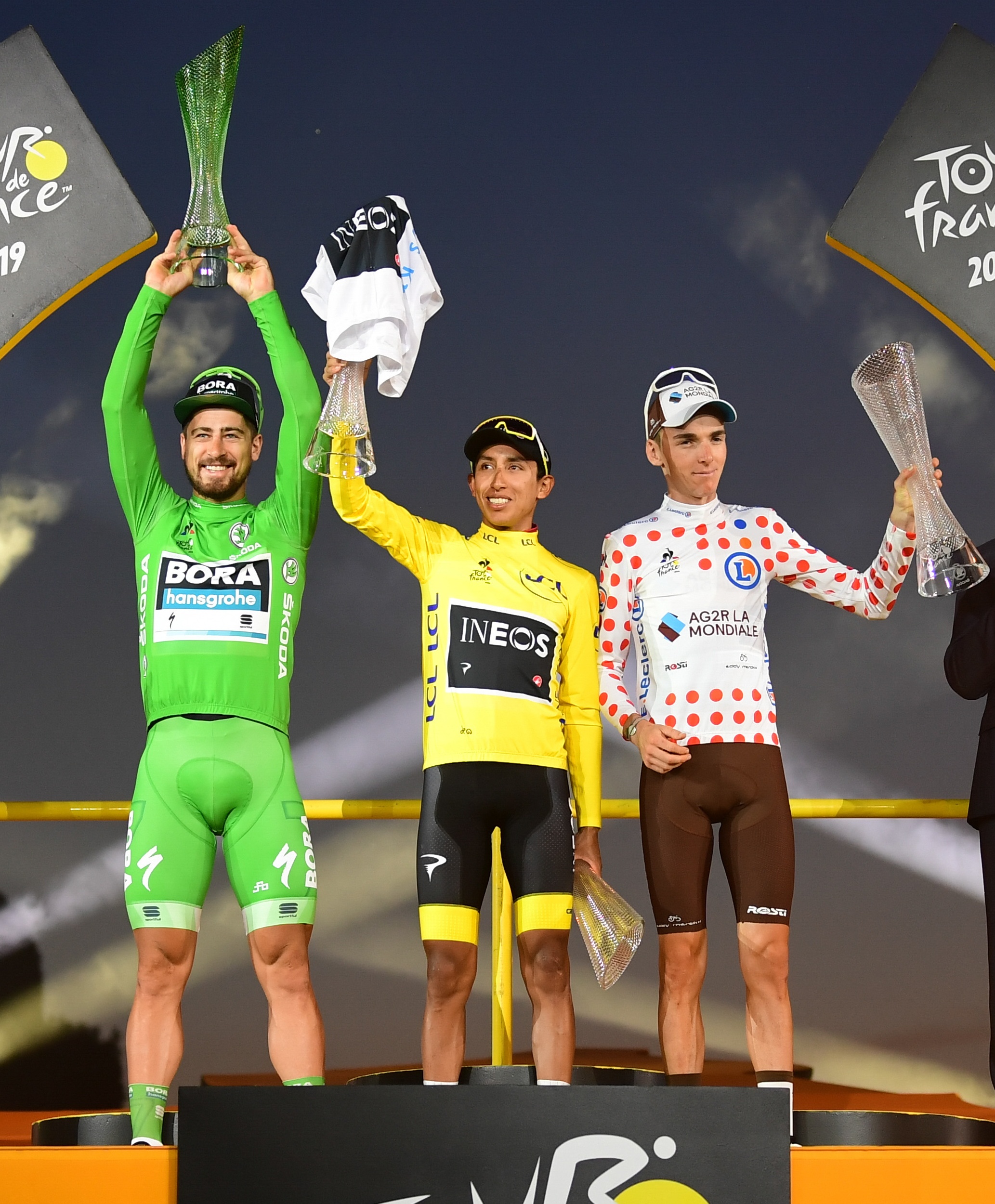 Tour de France winner Egan Bernal celebrates with crystal trophy from